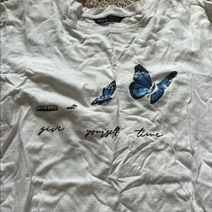 SHEIN White T-Shirt with Blue Butterfly Design